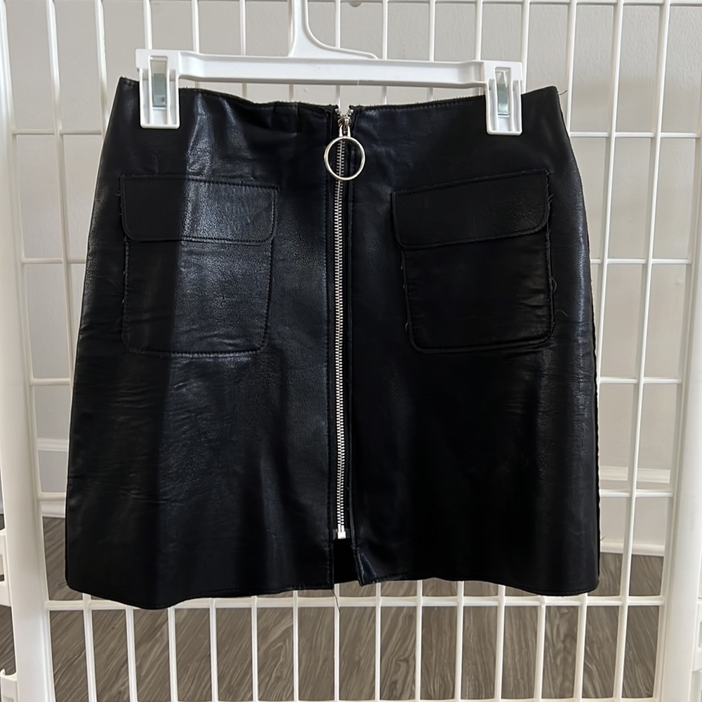 Black leather mini skirt